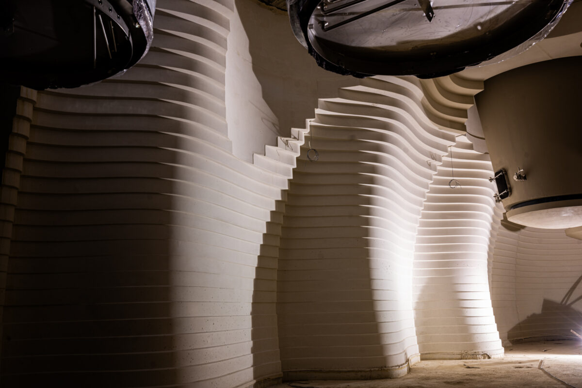 Wine cellar architecture: custom-made formwork for signature projects 12 Winery Architecture: Curved stepped exposed concrete walls constructed using custom-made Arbloc formwork for a winery in France